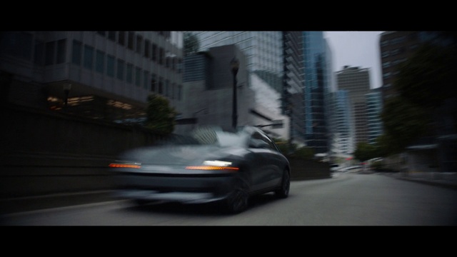 Video Reference: Tire, Car, Building, Vehicle, Automotive lighting, Automotive tire, Automotive design, Mode of transport, Asphalt, Skyscraper