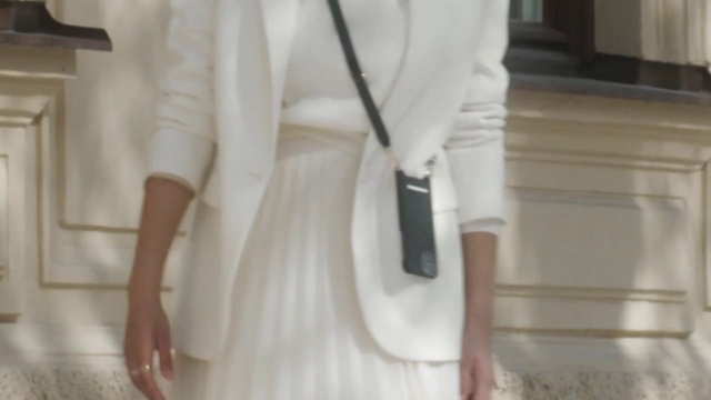 Video Reference: Outerwear, Shoulder, Neck, Waist, Sleeve, Dress shirt, Street fashion, Grey, Collar, Bridal clothing