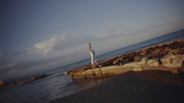 Video Reference: Cloud, Water, Sky, Wood, Tower, Coastal and oceanic landforms, Terrain, Horizon, Landscape, Wind