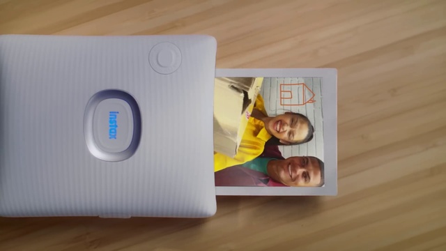 Video Reference: Smile, Product, Material property, Wood, Font, Portable media player, Media player, Rectangle, Gadget, Ipod