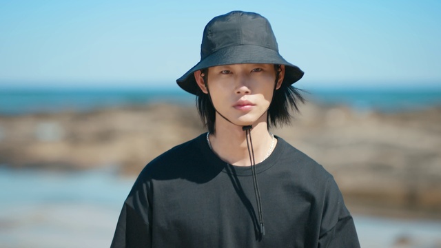 Video Reference: Lip, Chin, Sky, Eye, Hat, Azure, Flash photography, Neck, Sleeve, Cap