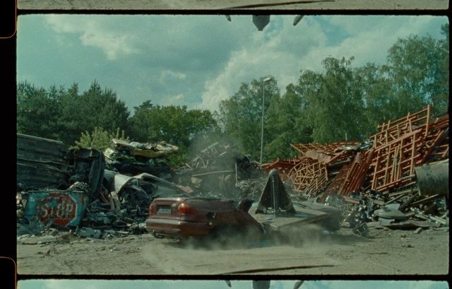 Video Reference: Wheel, Sky, Cloud, Tire, Motor vehicle, Water, Vehicle, Tree, Art, Wall