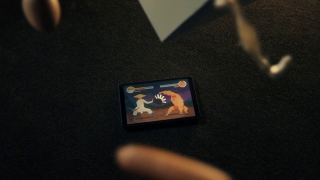 Video Reference: Sleeve, Gesture, Motor vehicle, Vehicle door, Gadget, Electric blue, Font, Space, Automotive design, Fashion accessory