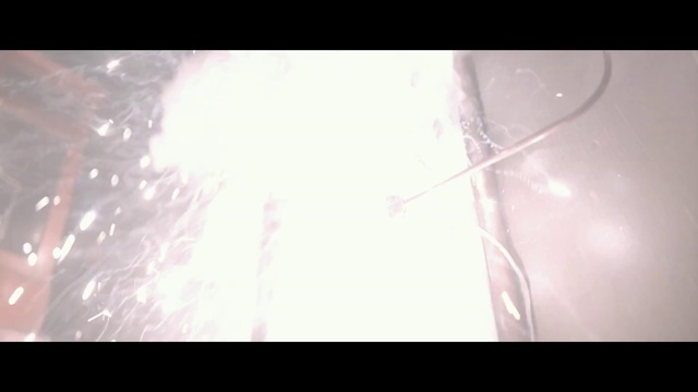 Video Reference: Atmosphere, Gesture, Flash photography, Sky, Font, Tints and shades, Rectangle, Event, Lens flare, Darkness