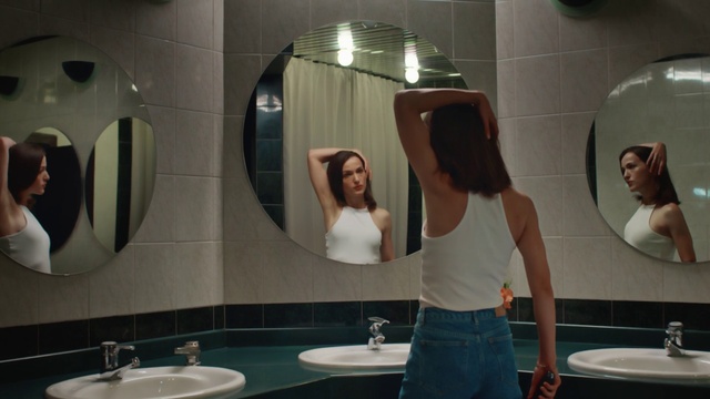 Video Reference: Mirror, Tap, Plumbing fixture, Bathroom sink, Photograph, Sink, Purple, Bathroom, Interior design, Architecture