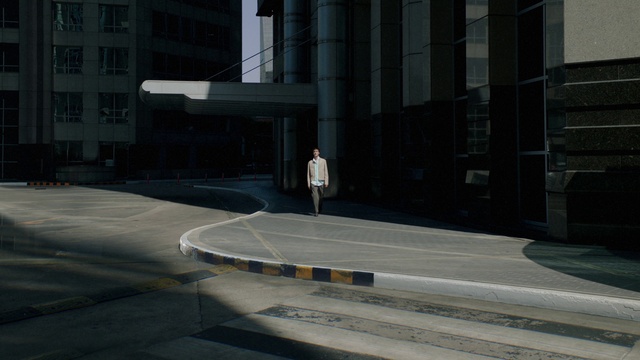 Video Reference: Building, Window, Road surface, Asphalt, Urban design, Grey, Sidewalk, Composite material, City, Condominium