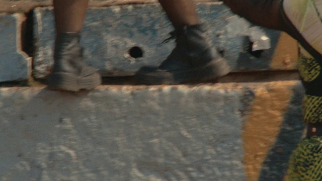 Video Reference: Automotive tire, Wood, Road surface, Flooring, Floor, Asphalt, Gas, Hardwood, Human leg, Concrete