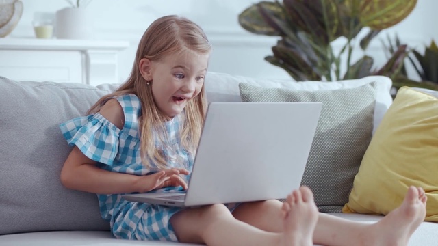 Video Reference: Smile, Couch, Comfort, Computer, Netbook, Happy, Gadget, Finger, Leisure, Toddler