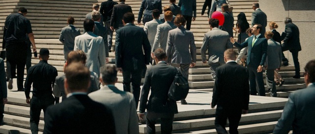 Video Reference: Clothing, Trousers, Outerwear, Infrastructure, Coat, Sleeve, Standing, Gesture, Dress shirt, Suit