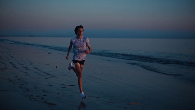 Video Reference: Water, Sky, Cloud, Shorts, Beach, Coastal and oceanic landforms, Grey, Flash photography, Atmospheric phenomenon, Happy