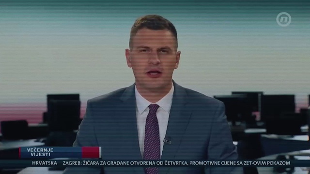 Video Reference: Forehead, Dress shirt, Coat, Tie, Collar, Spokesperson, Blazer, Suit, Television presenter, News