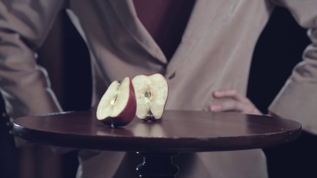 Video Reference: Table, Furniture, Black, Flash photography, Sleeve, Gesture, Dress, Finger, Event, Formal wear