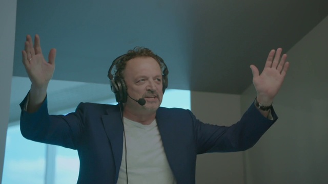 Video Reference: Hand, Arm, Sleeve, Gesture, Finger, Spokesperson, Microphone, Thumb, Blazer, Public speaking