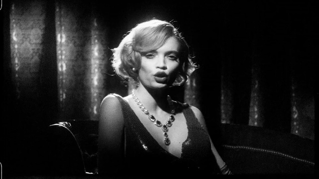 Video Reference: Flash photography, Black-and-white, Style, Monochrome photography, Necklace, Monochrome, Jewellery, Event, Darkness, Audio equipment