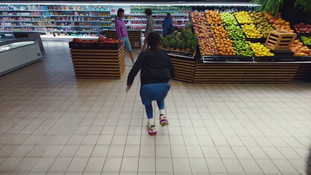 Video Reference: Green, Standing, Shelf, Flooring, Leisure, Natural foods, Bag, Fun, Recreation, Retail