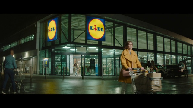 Video Reference: Flash photography, Building, City, Advertising, Midnight, Font, Facade, Signage, Road, Street