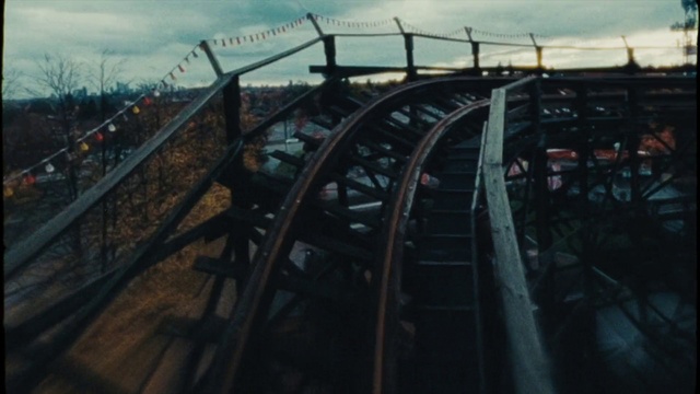 Video Reference: Sky, Cloud, Water, Roller coaster, Recreation, Track, Metal, Amusement ride, City, Wheel