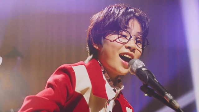 Video Reference: Microphone, Glasses, Public address system, Music artist, Entertainment, Music, Musician, Audio equipment, Singing, Performing arts