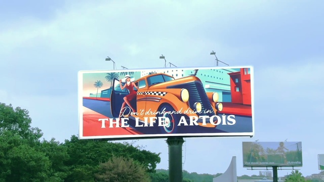 Video Reference: Sky, Billboard, Cloud, Tree, Font, Motor vehicle, Aircraft, Art, Advertising, Signage