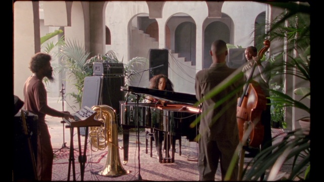 Video Reference: Musician, Plant, Musical instrument, Music, Table, Window, Event, Suit, Metal, Tradition