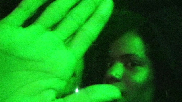 Video Reference: Green, Gesture, Finger, Thumb, Wrist, Magenta, Close-up, Electric blue, Event, Flesh