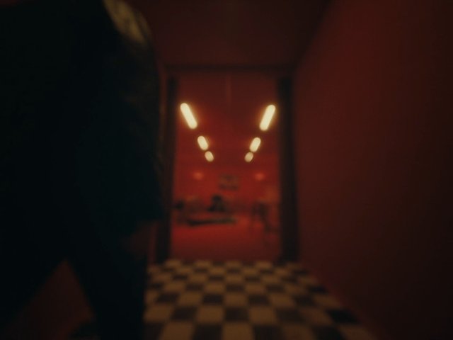 Video Reference: hallway, corridor, indoor, red walls, checkered floor, ceiling lights, dim lighting, blurred, low angle, interior, empty room, moody, abstract, narrow passage