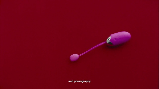 Video Reference: Magenta, Audio equipment, Recreation, Electric blue, Font, Circle, Macro photography, Fashion accessory, Headphones, Ball