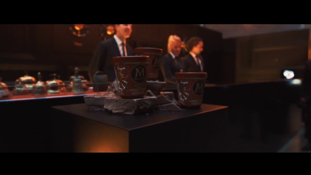 Video Reference: Tableware, Entertainment, Suit, Event, Space, Darkness, Chair, Television program, Table, Fun