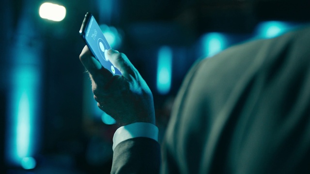 Video Reference: Hand, Entertainment, Music, Finger, Performing arts, Music artist, Gadget, Electric blue, Visual effect lighting, Event