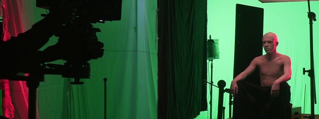 Video Reference: Green, Black, Textile, Microphone stand, Tints and shades, Font, Audio equipment, Technology, Art, Electronic device
