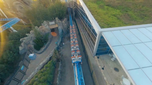 Video Reference: Daytime, Plant, Mode of transport, Urban design, Thoroughfare, Building, Vehicle, Slope, Landscape, City