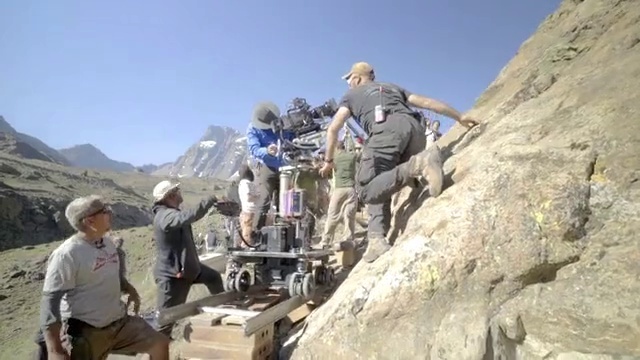 Video Reference: Sky, Mountain, Wheel, Vehicle, Motor vehicle, Helmet, Automotive tire, Marines, Bedrock, Tire