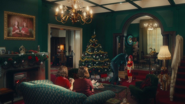 Video Reference: Christmas tree, Christmas ornament, Furniture, Light, Lighting, Picture frame, Window, Couch, Holiday ornament, Decoration