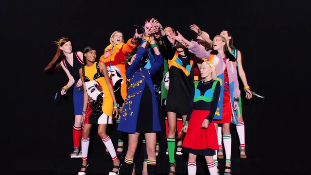 Video Reference: Smile, Dress, Performing arts, Entertainment, Choreography, Team sport, Shorts, Player, Event, Fashion design