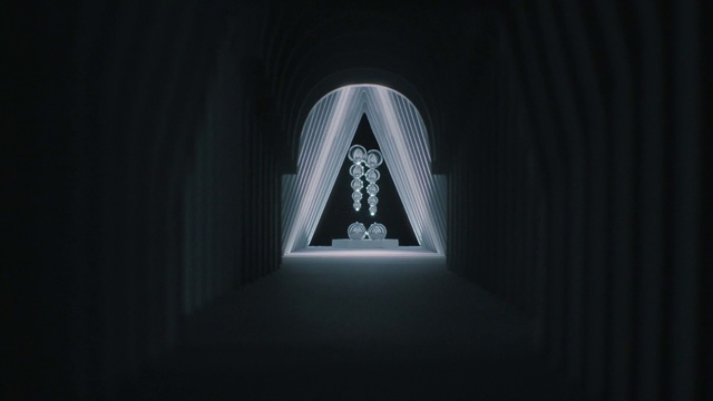 Video Reference: Triangle, Font, Art, Symmetry, Tints and shades, Darkness, Graphics, Monochrome photography, Arch, Pattern
