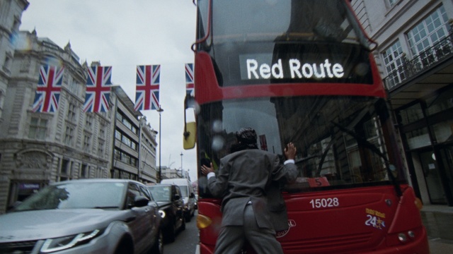 Video Reference: Bus, Land vehicle, Vehicle, Motor vehicle, Car, Building, Window, Automotive lighting, Automotive design, Automotive exterior