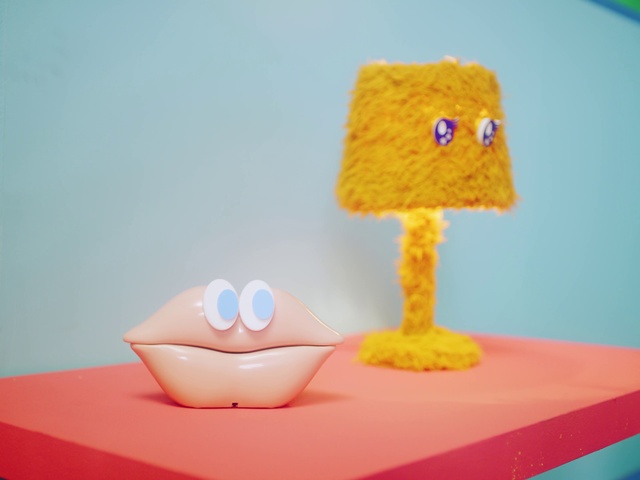 Video Reference: Table, Orange, Textile, Toy, Rectangle, Art, Chair, Desk, Wood, Serveware