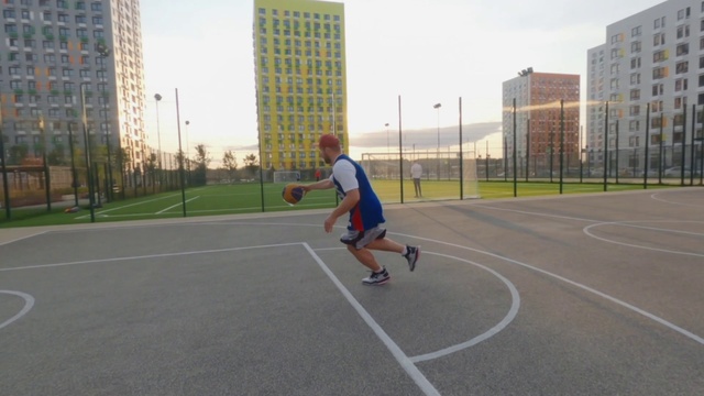 Video Reference: Shorts, Sky, Sports equipment, Plant, Building, Cloud, Asphalt, Ball, Player, Tree