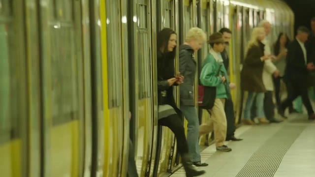 Video Reference: Train, Rolling stock, Public space, Public transport, Jacket, Railroad car, Passenger, Fun, City, Event