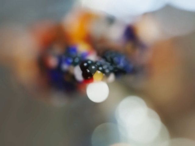Video Reference: blurred, bokeh, abstract, close-up, colorful, lights, out of focus, indoor, soft focus, defocused, background, abstract texture