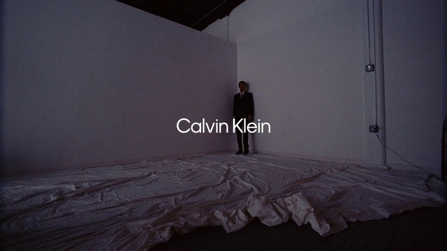 Video Reference: Grey, Flash photography, Wood, Floor, Flooring, Tints and shades, Composite material, Font, Space, Darkness