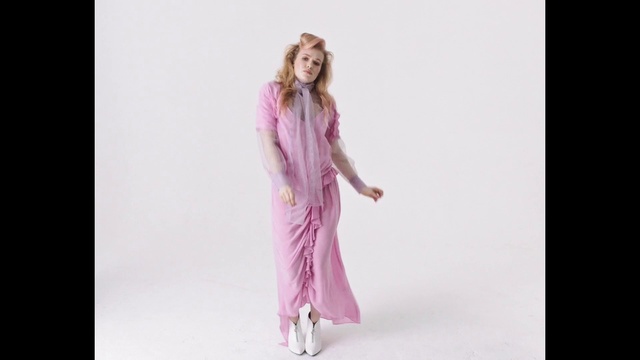 Video Reference: Hair, Arm, Shoulder, Leg, Purple, Human body, Neck, Sleeve, Waist, Gesture