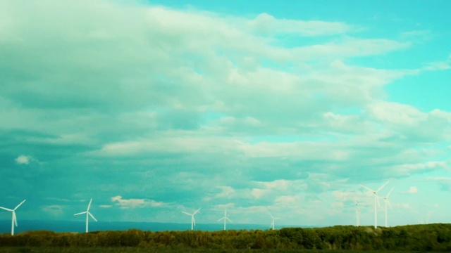 Video Reference: Cloud, Sky, Windmill, Atmosphere, Ecoregion, Wind farm, Natural landscape, Infrastructure, Natural environment, Grass