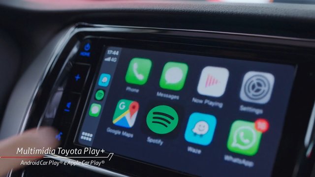 Video Reference: car interior, infotainment screen, touchscreen, smartphone apps, apple carplay, android auto, gps, music, messaging, settings, whatsapp, spotify, navigation, dashboard, technology, close up