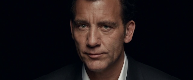 Video Reference: Forehead, Nose, Cheek, Flash photography, Gesture, Ear, Wrinkle, Blazer, Dress shirt, Suit