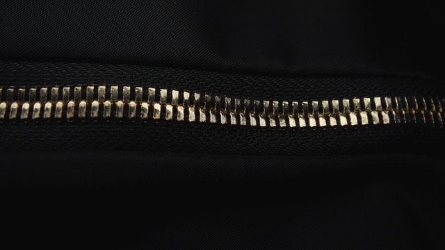 Video Reference: zipper, metal, fabric, texture, closeup, macro, dark, black, detail, fastener, textile, abstract, pattern, shiny, contrast