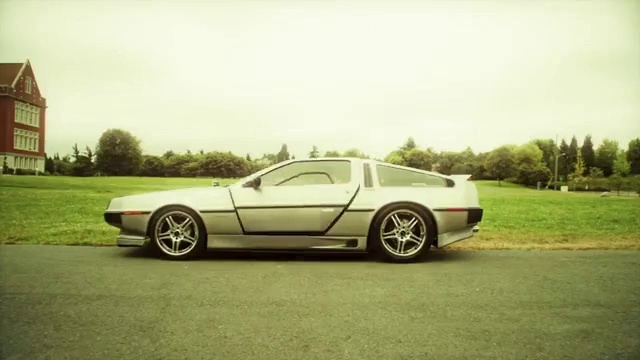 Video Reference: Wheel, Tire, Vehicle, Sky, Hood, Automotive tire, Car, Automotive lighting, Window, Plant