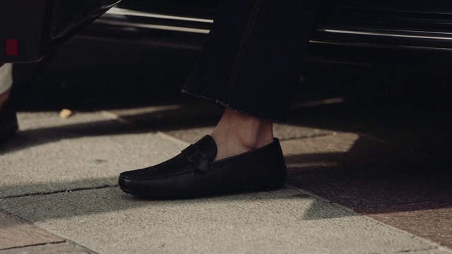 Video Reference: Dress, Road surface, Knee, Thigh, Basic pump, Street fashion, Grey, Calf, Floor, Asphalt