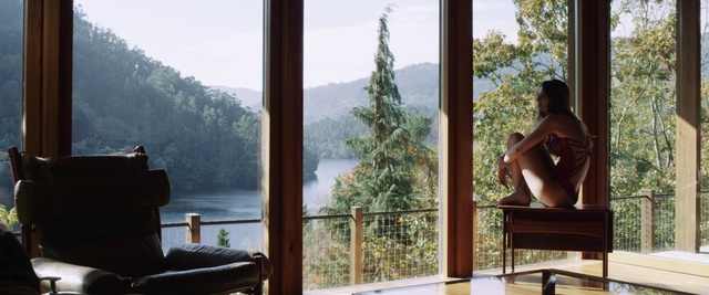 Video Reference: Sky, Water, Furniture, Window, Tree, Interior design, Shade, Comfort, Wood, Table