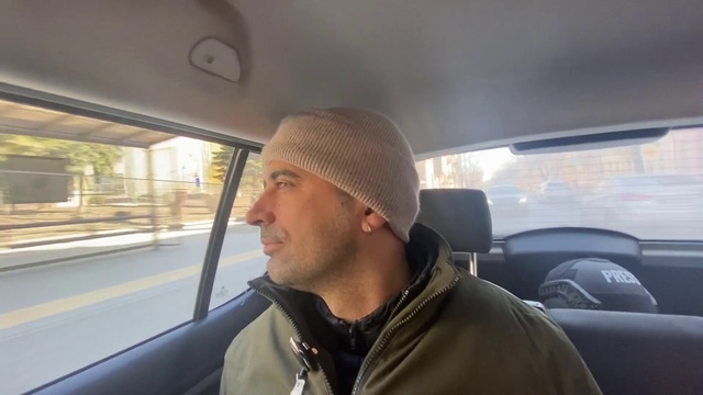 Video Reference: Vehicle, Car, Motor vehicle, Mode of transport, Tree, Automotive mirror, Automotive design, Hat, Beard, Automotive exterior